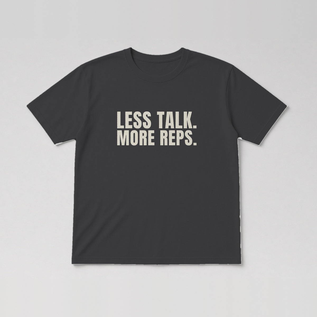 Less Talk. More Reps. Tee in Charcoal
